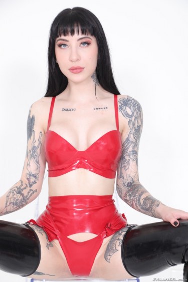 Charlotte Sartre In Red And Black Latex 7