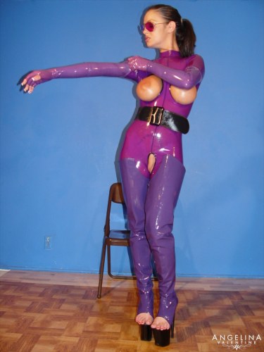 Angelina Valentine In A Purple Latex Catsuit And Sunglasses 14