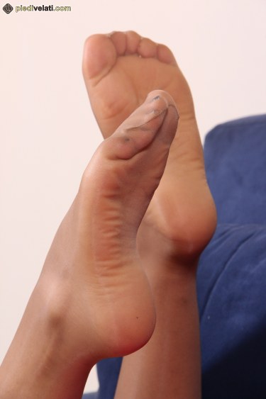 Beautiful Brunette Shows Her Sexy Feet In Nylons 12