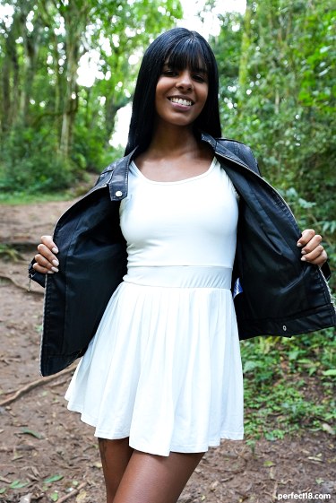 Brunette Beauty Relaxes In Forest Clearing 2