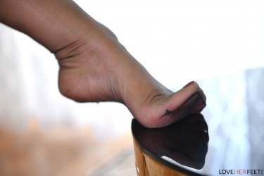 Dani Jensen Spreads Her Stockinged Legs 9