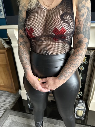 Inked Milf In Black Trousers Body Stocking And Heels 4