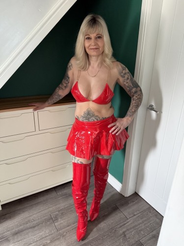 Inked Milf In Red Latex 1