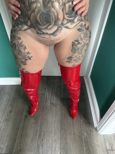 Inked Milf In Red Latex 11