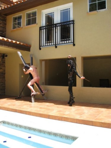 Mistress Jean Bardot With Her Slave At The The Pool 3