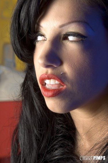 Roxy Deville In Kneehigh Boots Teases On A Table 13