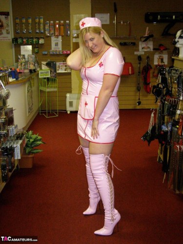 Samantha In A Pink Latex Nurse Costume 3