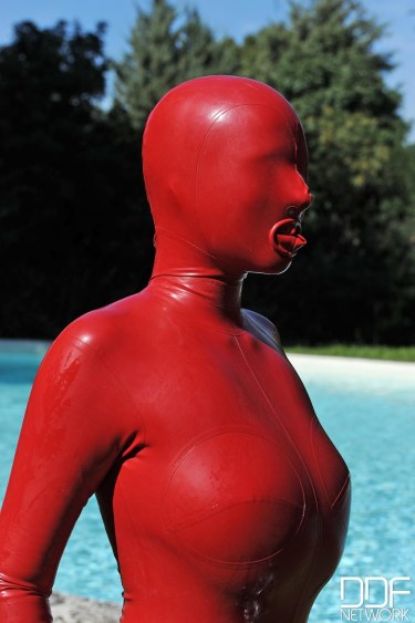 Sandy K In Red Latex Suit 1