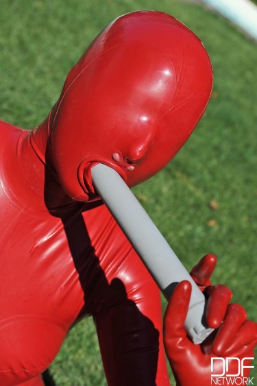 Sandy K In Red Latex Suit 10