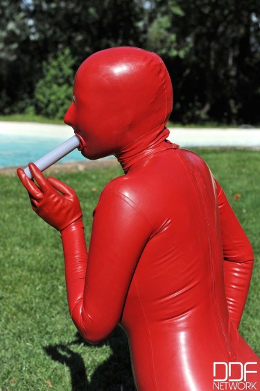 Sandy K In Red Latex Suit 15