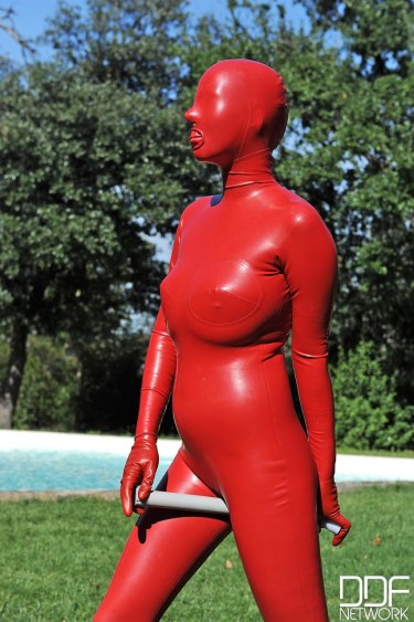Sandy K In Red Latex Suit 19