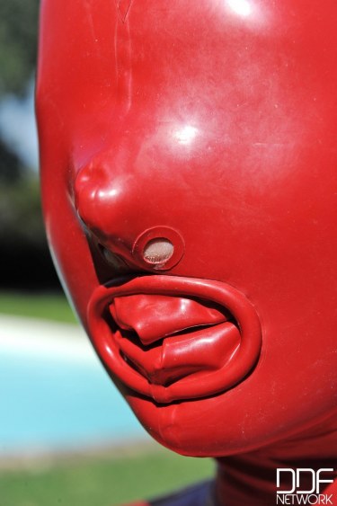 Sandy K In Red Latex Suit 20